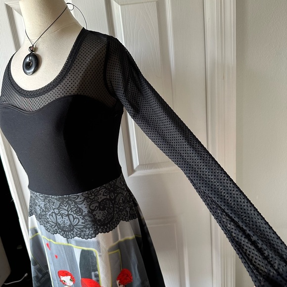 fun unique dress ! slight flare skirt and a sheer back and sleeves. - Picture 2 of 6